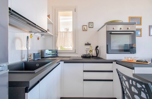 Castelsardo Apartment | Apartment 'Ad Occhi Aperti' with Sea View, Wi-Fi and Air Conditioning