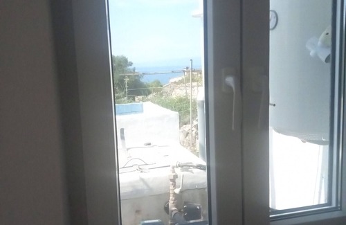 Antipaxos Apartment | Apartment 'Ambelaki' with Sea View, Private Garden and Wi-Fi