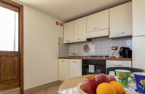 Sassari Apartment | Apartment "App 4 Posti con Terrazza Vista Mare" with Sea View, Pool, Wi-Fi, Garden & Terrace