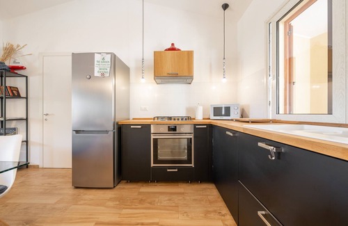 Fluminimaggiore Apartment | Apartment "Attic with a View", Private Terrace & Wi-Fi