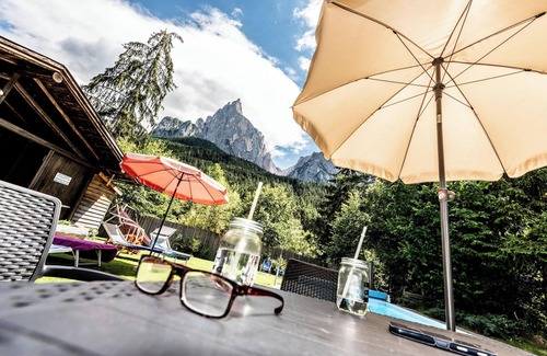 Siusi Apartment | Apartment "Bergfrieden 2 A" with Mountain View, Pool, Wi-Fi, Terrace & Garden