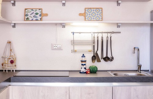 Trinita d'Agultu e Vignola Apartment | Apartment 'Borgo Degli Ulivi' with Private Garden and Air Conditioning