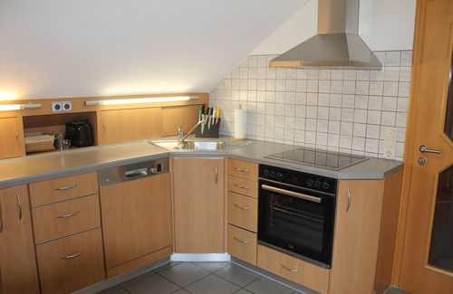 Rollesbroich Apartment | Apartment Braun - cozy apartment with balcony in a quiet side street