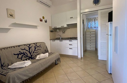 San Teodoro City Centre House | Apartment by Francesco Villaggio degli Ulivi San Teodoro