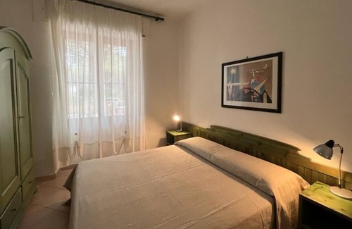 Cala Liberotto Apartment | Apartment 'Cala Liberotto' with Private Terrace, Wi-Fi and Air Conditioning