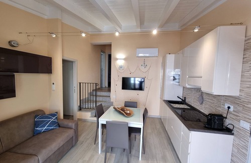 Trinita d'Agultu e Vignola Apartment | Apartment 'Caprera' with Private Terrace, Wi-Fi and Air Conditioning