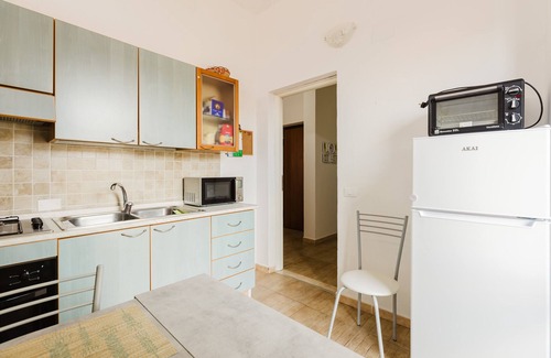 Solanas Apartment | Apartment 'Casa Rimedia' with Balcony, Wi-Fi and Air Conditioning