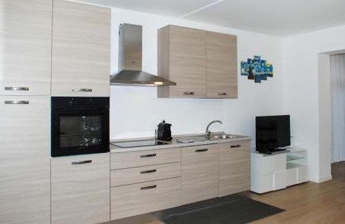 Bissone Apartment | Apartment Charming Gardenview App- 105 by Interhome