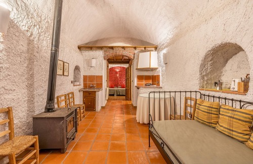 Guadix Apartment | Apartment 'Cueva Karmen' with Mountain View, Shared Pool and Wi-Fi