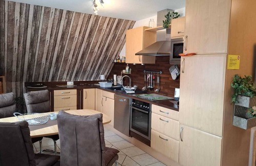Neßmersiel Apartment | Apartment directly on the dike, central quiet location, modern, WLAN, up to 5 pers.