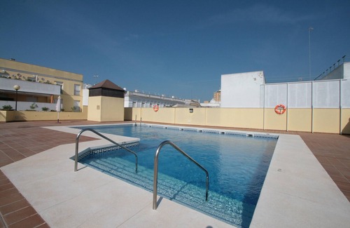 Sanlucar de Barrameda Apartment | Apartment with POOL, TERRACE, A/C, WIFI and PARKING in the center.