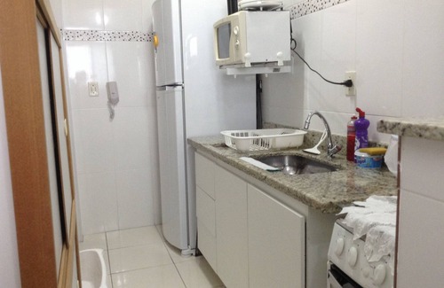 Praia Grande Apartment | Apartment facing the sea with barbecue on the balcony