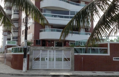 Praia Grande Apartment | Apartment facing the sea with barbecue on the balcony