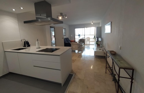 Cala Apartment | Apartment facing the sea. In the center of the Poniente Beach. WIRELESS. Swimming pool