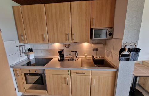 Schillig Apartment | Apartment 'Ferienwohnung 27 Sandbank, 80 Qm' with Sea View, Balcony and Wi-Fi