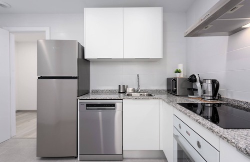 Estepona Apartment | Apartment 'Figaro Terrace&Pool Apartment' with Shared Pool, Wi-Fi and Air Conditioning