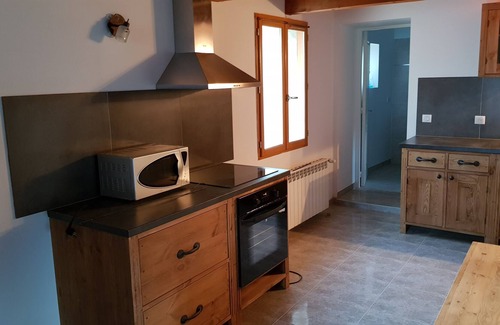 Saint-Jean-de-Bueges Apartment | Apartment in village house sleeps 7, garden and pool.