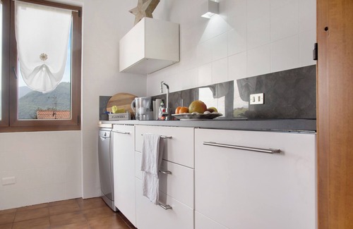 Maccagno Apartment | Apartment 'Il Bacio Del Sole' with Lake View, Private Terrace and Shared Garden