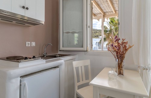 Kionia Apartment | Apartment In A Hotel 'Ninemia Suites Tinos Superior 201' with Sea View, Wi-Fi and Air Conditioning