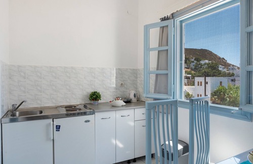 Grikos House | Apartment In A Hotel "Pico Bello Patmos 16" with Private Terrace, Shared Garden & Wi-Fi