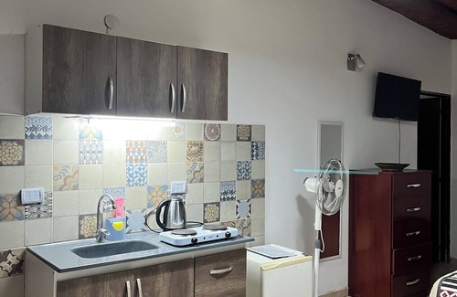 San Agustin de Valle Fertil Apartment | Apartment in Valle Fértil, 3 blocks from the main square.