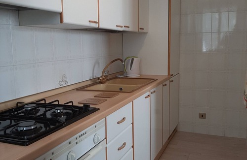 Sandra Apartment | Apartment 'Casa Fiore di Magnolia' with Private Garden, Balcony and Air Conditioning
