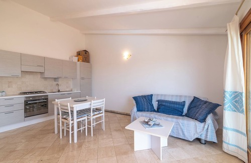 Porto Pozzo Apartment | Apartment 'Il Fiordo 27' with Sea View, Shared Pool and Air Conditioning