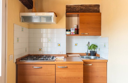 Bosa Historic Centre Apartment | Apartment 'L'attico Sul Fiume' with Private Terrace, Wi-Fi and Air Conditioning