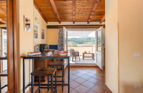 Bosa Historic Centre Apartment | Apartment 'L'attico Sul Fiume' with Private Terrace, Wi-Fi and Air Conditioning