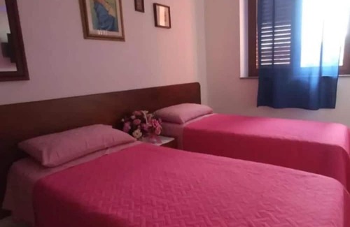 Porto Torres Apartment | Apartment 'La Casa Dello Zio Tom' with Balcony, Wi-Fi and Air Conditioning