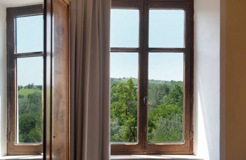 Costigliole d'Asti Apartment | Apartment 'La Rocca di Efisio - Grignolino' with Balcony, Wi-Fi and Air Conditioning