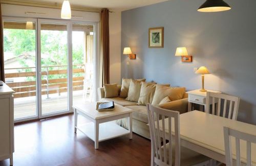 Parentis-en-Born Apartment | Apartment Les Cottages du Lac T3 by Interhome