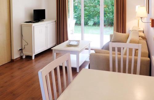 Parentis-en-Born Apartment | Apartment Les Cottages du Lac T1 by Interhome