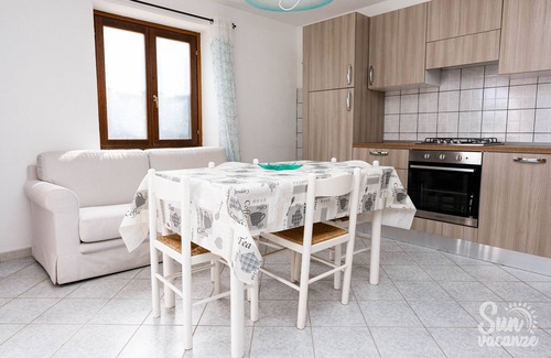 Budoni Apartment | Apartment 'Malamuri 5 Sun Vacanze' with Sea View, Shared Pool and Shared Garden