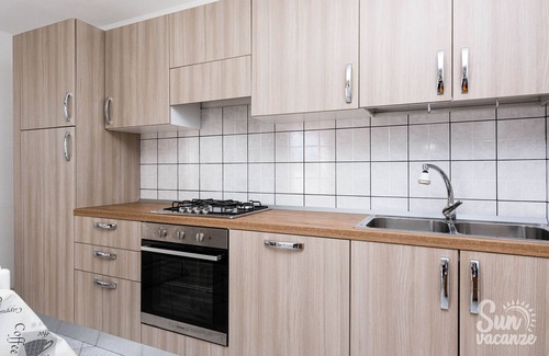 Budoni Apartment | Apartment 'Malamuri 5 Sun Vacanze' with Sea View, Shared Pool and Shared Garden