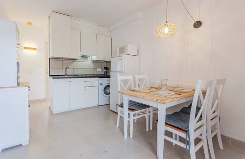 Cala'n Bosch Apartment | Apartment 'Marlena' with Shared Pool, Wi-Fi and Air Conditioning