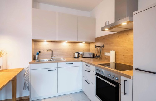 Gilching Apartment | Apartment "Max" at the Schloeglhof with Wi-Fi & Balcony