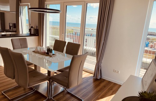 Schillig Apartment | Apartment 'Moin Mehrblick' close to the Beach with Terrace & Wi-Fi
