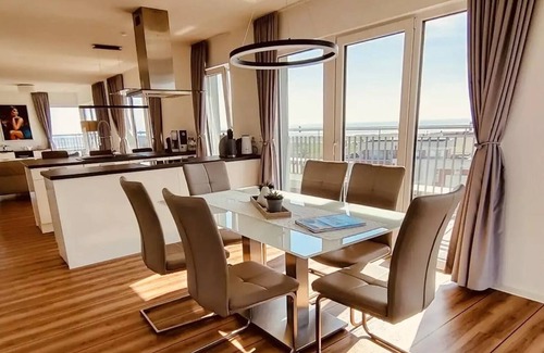 Schillig Apartment | Apartment 'Moin Mehrblick' close to the Beach with Terrace & Wi-Fi