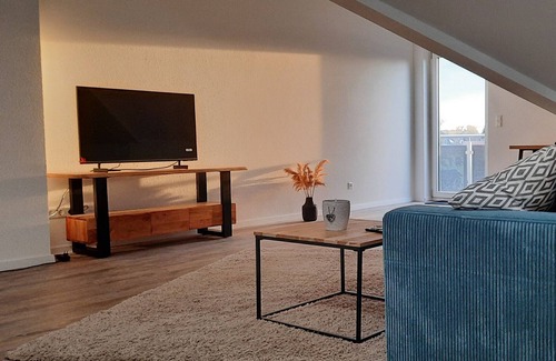 Sinzheim Apartment | Apartment 'Neubau Ferienwohnung Kleine Auszeit' with Mountain View, Balcony and Wi-Fi