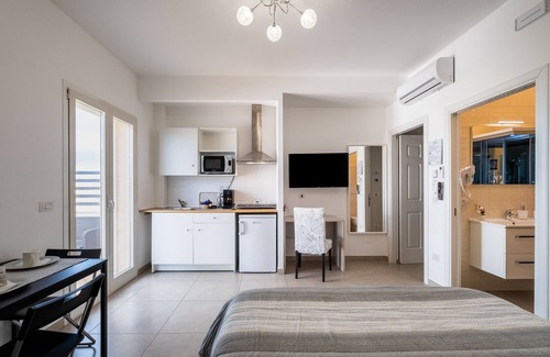 Copertino Apartment | Apartment 'Over The Top - Lu Ientu' with Private Terrace, Wi-Fi and Air Conditioning
