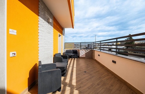 Copertino Apartment | Apartment 'Over The Top - Lu Ientu' with Private Terrace, Wi-Fi and Air Conditioning