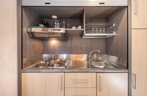 Province of Cagliari Apartment | Apartment Patio Borgo Anninnia with BBQ, Shared Garden & Wi-Fi