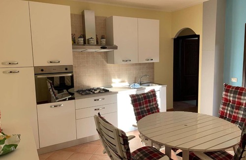 Monte Petrosu House | Apartment 'Prestige Exclusive' with Communal Pool, Wi-Fi and Air Conditioning