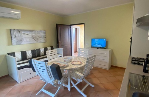 Monte Petrosu House | Apartment 'Prestige Exclusive' with Communal Pool, Wi-Fi and Air Conditioning
