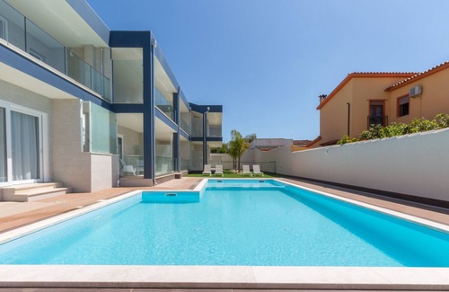 Villa San Pietro Apartment | Apartment "Residence Meridian Unità 6" Near the Beach with Mountain View, Pool, A/C, Wi-Fi & Balcony