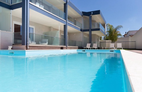 Villa San Pietro Apartment | Apartment "Residence Meridian Unità 6" Near the Beach with Mountain View, Pool, A/C, Wi-Fi & Balcony
