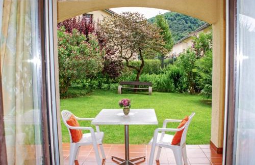 Caslano Apartment | Apartment Residenza Parcolago Apt 018 mit Garten by Interhome