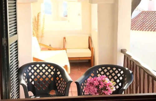 Platges de Fornells Apartment | Apartment 'Sacalma' with Shared Pool, Wi-Fi and Air Conditioning
