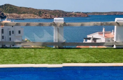 Platges de Fornells Apartment | Apartment 'Sacalma' with Shared Pool, Wi-Fi and Air Conditioning